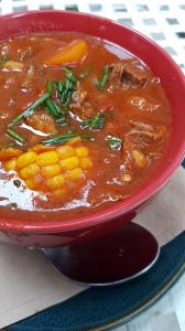 Beef stew with corn cob and pumpkin